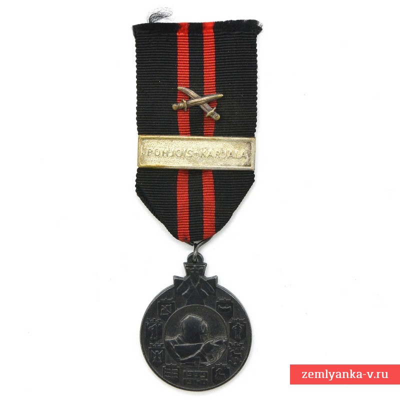 Финская медаль за войну 1939-1940 гг, с планкой «Pohjois-Karjala» и мечами.