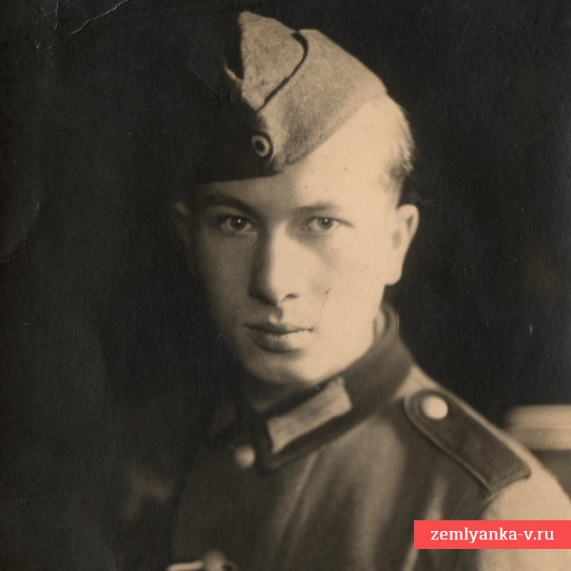 Фото ефрейтора Вермахта со знаком за ранение и "Общий штурм"