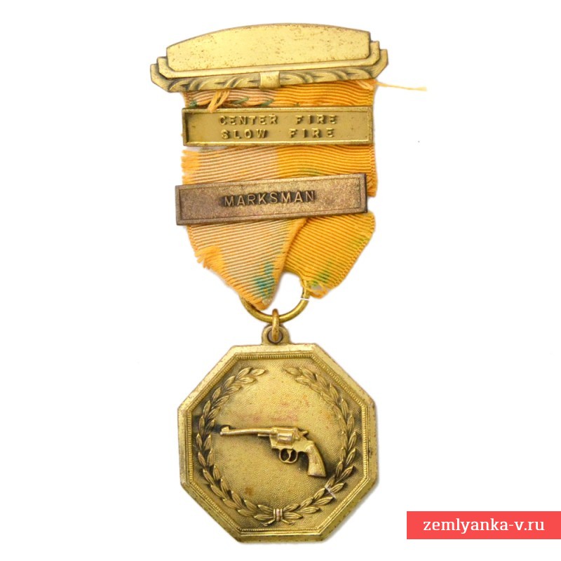 Золотая американская медаль за стрельбу из револьвера центрального боя